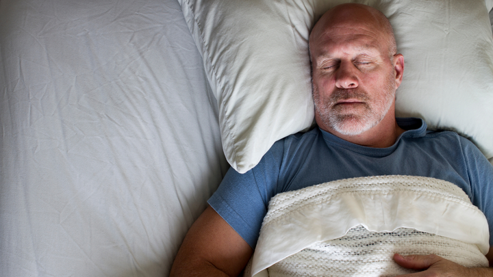 man sleeps peacefully